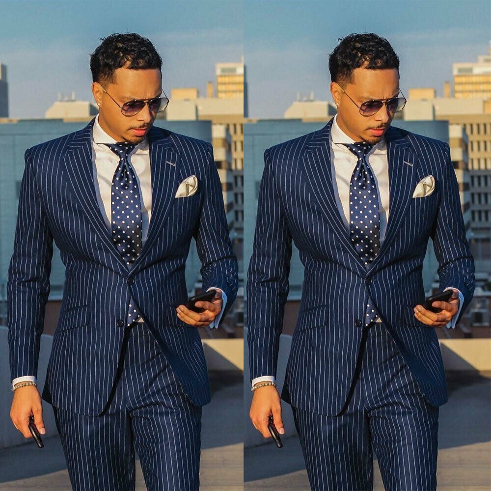 Striped suit business casual suit men's three-piece suit Shopping category: Fashion City (24-35 years old) Placket: single row one button Error range: 1-3 Suitable for the season: Four seasons Fabric name: polyester fiber Main fabric composition: nylon/ny