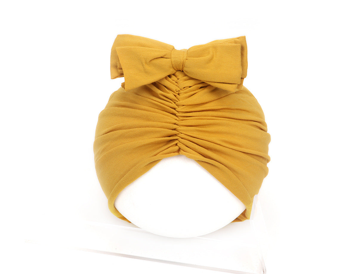 Cute Baby Hat Newborn Soft Baby Girl Hat Turban Infant Toddler Baby Cap Bonnet Headwraps Overview: Made from a soft knitted fabric, stretch and very comfortable to wear. A wide range of solid candy colors for your choice, all colors in stock. A great acce