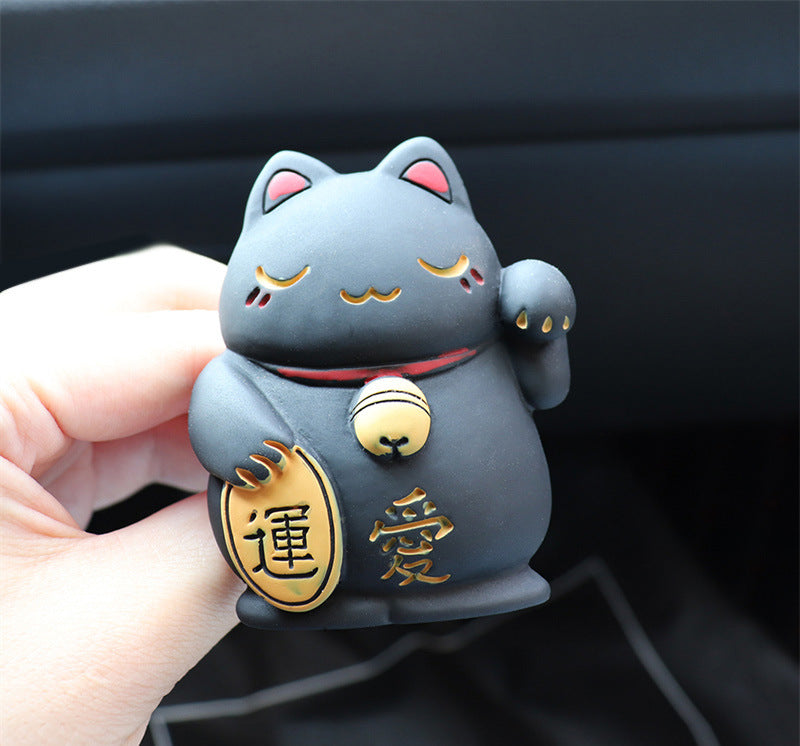 Car Vent Aromatherapy Clip Car-mounted Air Conditioning Perfume Decoration Product information: Color: Black Cat, White Cat Material: Resin Function: decoration, mosquito repellent, refreshing, aromatic, odor removal, formaldehyde removal Size: Packing li