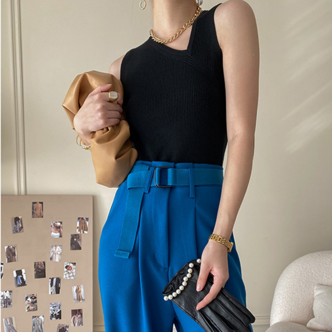 Diagonal Collar Slim Fit Bottoming Sleeveless Knitted Vest For Women Product information: Pattern: solid color Fabric name: viscose Color: white, yellow, black, khaki, red coffee, camel Sleeve type: regular sleeve Main fabric composition: viscose Size: fr