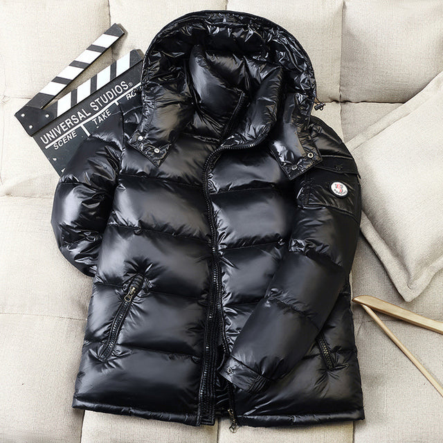 Glossy Duck Down Winter Jackets Introducing our new Glossy Duck Down Winter Jackets! These stylish and casual jackets are perfect for keeping you warm during the colder months. Made with thick and warm materials, they are sure to keep you comfortable in a