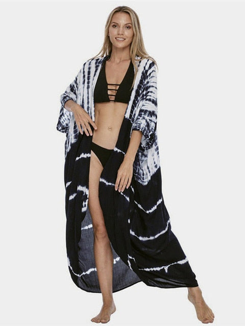 Bikini Cover-ups Cover-up in style with this Sexy Bikini Cover-ups Beach Pareo from our collection! Whether you're by the pool taking a dip or sipping drinks on the beach, this tie dye kimono dress is perfect for you. Feel both comfortable and fashionable