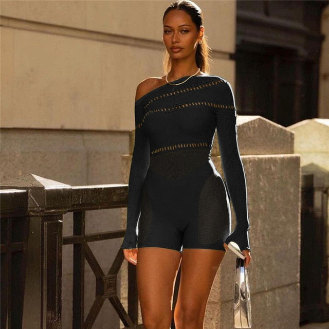 Lace See Through Midnight Playsuits Discover the allure of our Lace See Through Midnight Playsuits. This sexy and stylish romper is designed to make a statement, with its alluring lace detailing and see-through mesh that exudes Y2K vibes. The inclined sho
