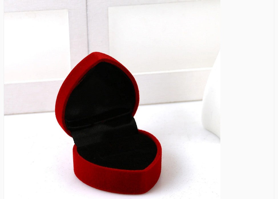 Jewelry Box Jewelry Box Flannelette Ring Box Overview: 100% new design and high quality Must-have for fashion women Have a beautiful appearance Specifications: Material :Velours Color: Red, purple, gray, dark blue, beige, jujube, pink Specifications :5x7.