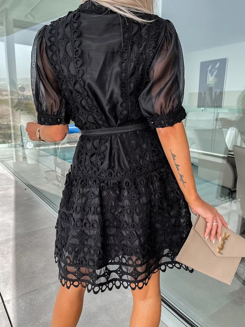Patchwork Lace Elegant Mini Dress Make a statement with the Patchwork Lace Elegant Mini Dress! The perfect choice for standing out from the crowd in sophisticated, high-fashion style. This short sleeve chic dress features patchwork lace for a stunning loo