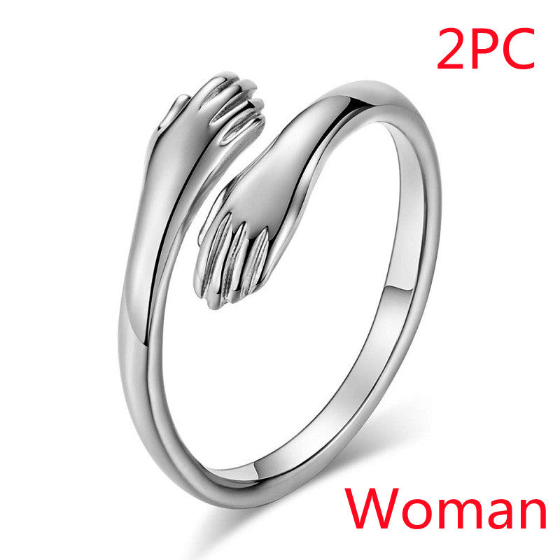 Alloy Simple Hands Hug Ring Opening Adjustable Jewelry Overview: Unique design, stylish and beautiful. Good material, comfortable to wear. A variety of colors, more choice Product Information Material: Alloy Style: Simple Modeling: Geometry Treatment proc
