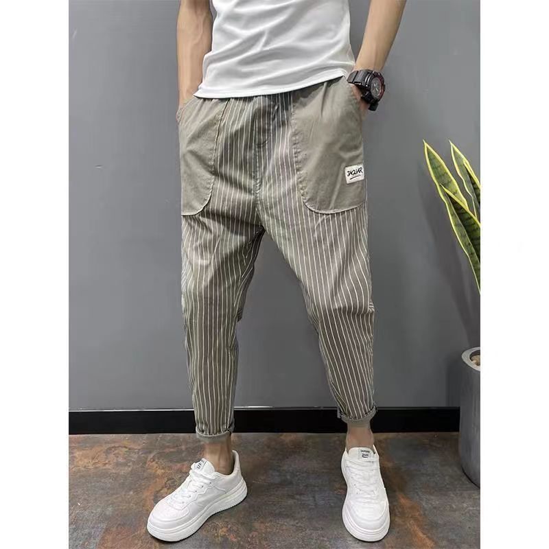 Korean Style Vertical Striped Harem Pants Product information: Style: Korean Pants type: straight Main fabric composition: polyester Color: dark khaki, light khaki Size Information: Size: M/L/XL/XXL/3XL/4XL Size: M 43-55KG, L 55-63KG, XL 63-70KG, 2XL70-78