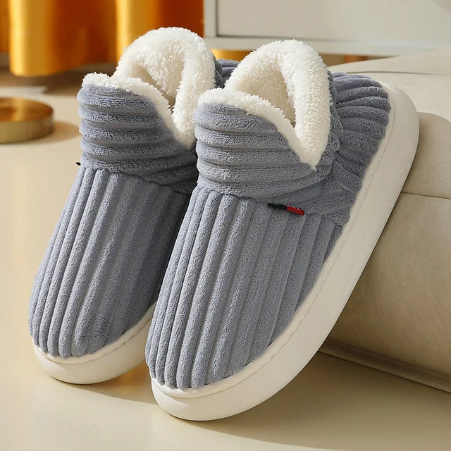 Unisex Home Slippers These Unisex Home Slippers are designed to provide warmth, comfort, and safety during the winter season. The combination of non-slip soles, cotton material, and a high-top design makes them a practical and cozy choice for indoor use.