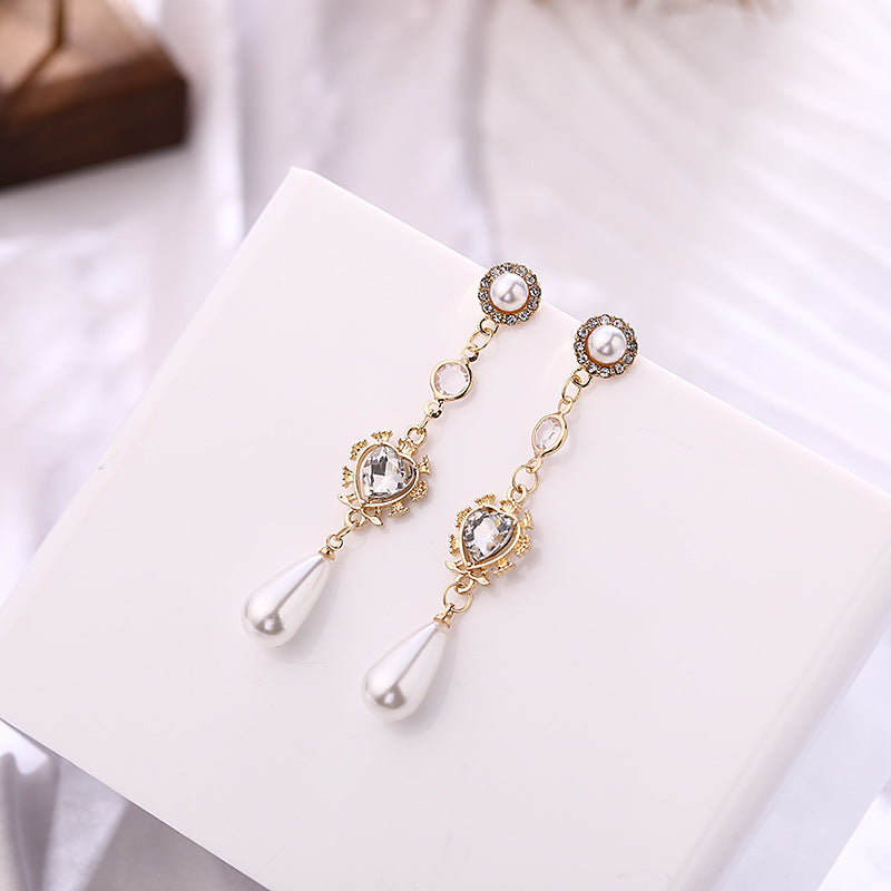 Pearl Earrings Love Rhinestones Long Earrings Women Style: Korean style Korean style / Korean style Material: Alloy Processing technology: electroplating Species; earrings Style; Women's Modeling: drop shape ; Pearl Earrings Love Rhinestones Long Earrings