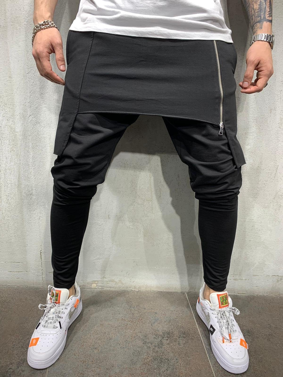 Personalized casual two-layer sports trousers Style: trousers Pants type: straight type Length: trousers Waist type: middle waist Is there a belt: No belt Pants placket: Tether closure Thickness: General Fabric name: Cotton Main fabric composition: polyes
