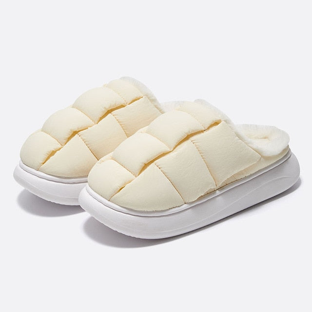 Winter Warm Home Slippers Keep your feet warm and snug with Winter Warm Home Slippers. Crafted from high-quality plush, these slippers offer superior warmth, comfort and support. The classic style of the slippers makes them perfect for any home décor, whi