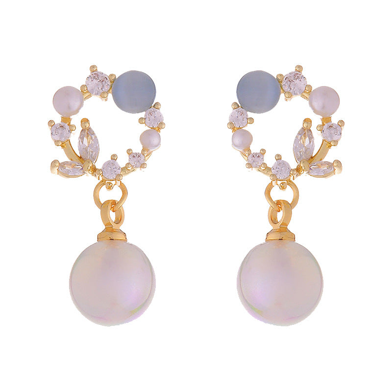High-Grade Blue Opal Fairy Fish Ji Pearl Stud Earrings Product information: Color: auricular needle model ES-69701 Applicable population: Female Material: Alloy Shape: Geometry Popular elements: irregular, group Diamond, balloon, double ring, asymmetric M