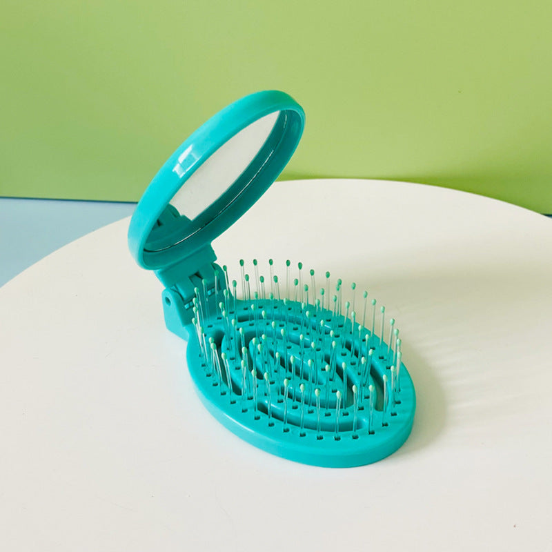 Household Portable Air Cushion Hollow Folding Massage Comb Product information: Color: pink, brown, beige, Lake blue, emerald Material: Plastic Size: 9 * 5.5cm Packing list: 1* Comb Product Image: Household Portable Air Cushion Hollow Folding Massage Comb