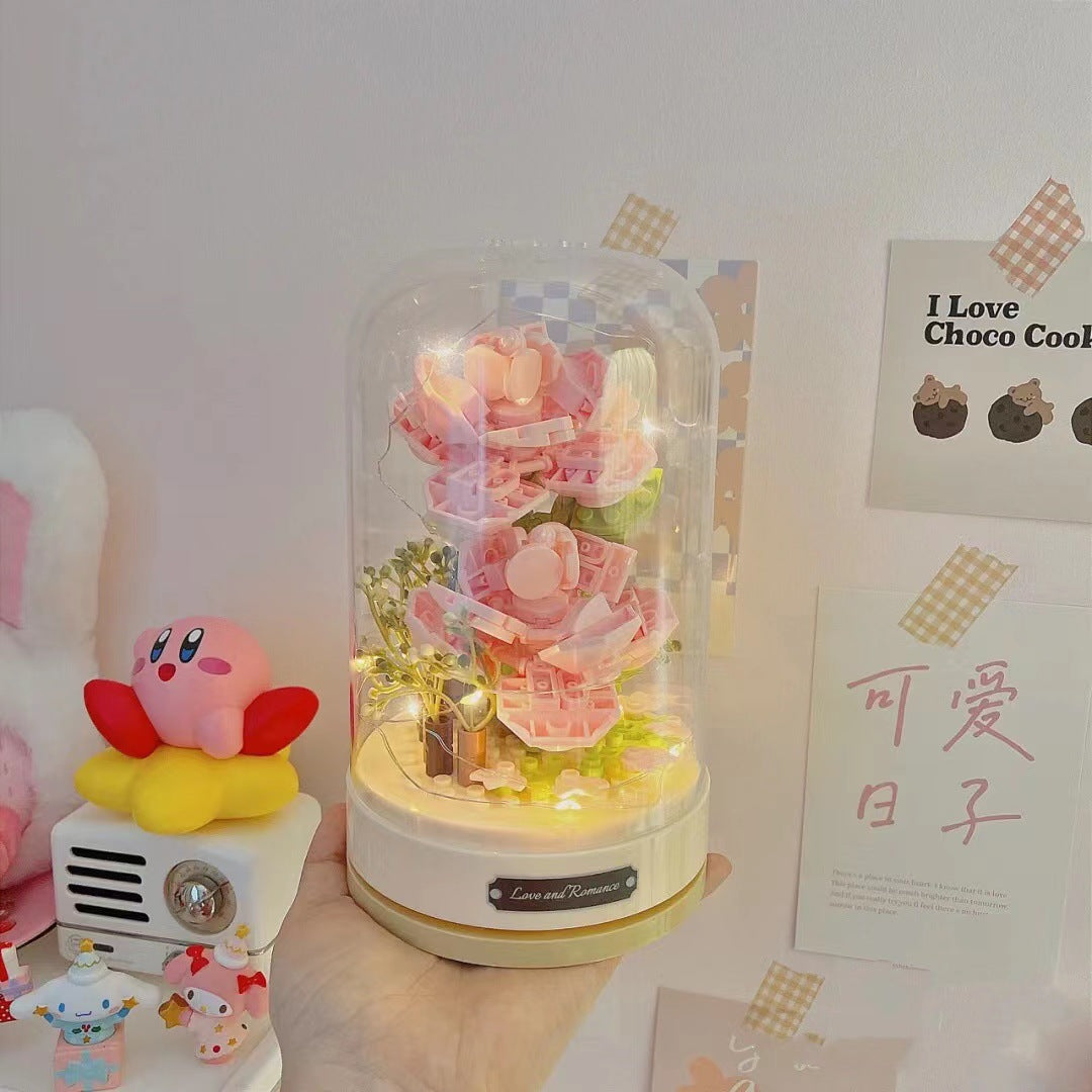 Rose Eternal Flower Building Block Jasmine Flower Assembled Music Box Product information: Material: plastic/plastic DIY: Yes Plastic material classification: ABS Plastic building block type: small particles Number of building blocks (pieces): 100-200 pie