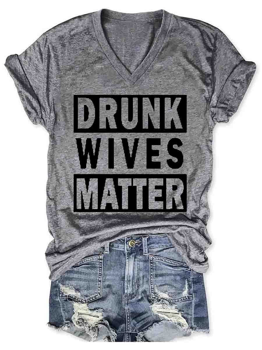 Drunk Wives Matter Women's V-Neck Shirt Ladies, let your wild side shine with the Drunk Wives Matter Women's V-Neck T-Shirt! This stylishly professional statement t-shirt will ensure you make a lasting impression. Crafted from quality cotton fabric and av
