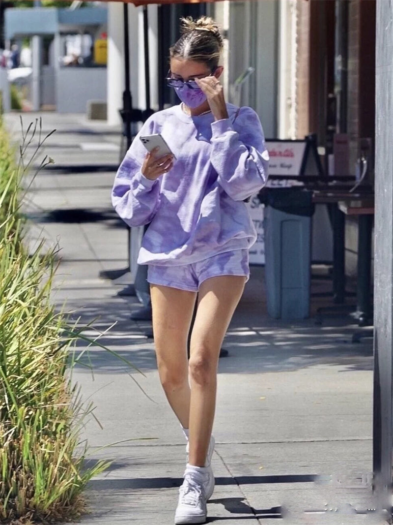 Women's Cotton Tie Dye Sweatshirt Shorts Sports Set Product information: Material: Cotton Style: fashion and simplicity Features:tie-dye Colour: purple Size Information: Size/cm Lenght Bust Shoulder Sleeve Pants Length Waist Hips S 64 124 60 55 32 60-110
