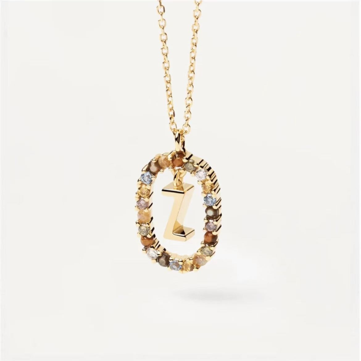 Colored Rhinestone Necklace 26 Alphabet Necklace 18K Fashion Jewelry Product Information: Material: Copper Treatment process: electroplating Style: Female Shape: Geometric type Chain pattern: cross chain Layer or not: No Material of pendant; copper Color: