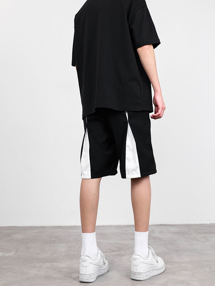 Niche Design Sense Stitching Contrast Color Suit Shorts Men Product Information: Waist type: Middle waist Colour: Black Elasticity: no bullet Pants length: five-point pants Style: overalls Trousers style: straight Size Information: Size: M L XL 2XL Note: