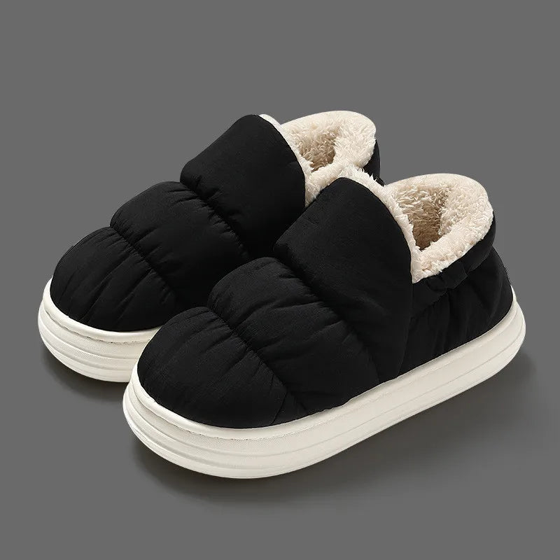 Thick Plush Unisex Flats These slippers seem to prioritize warmth and comfort with the thick plush material, making them suitable for cold weather. The waterproof feature adds practicality, and the non-slip platform makes them versatile for both indoor an