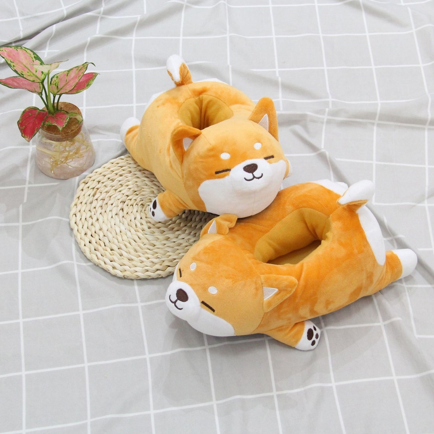 Cute Shiba Inu Dog Slippers Looking for something unique and fun to keep your feet warm this winter? Check out our Cute Shiba Inu Dog Slippers! These adorable slippers are made of soft plush fabric and feature an adorable Shiba Inu dog design. They're per
